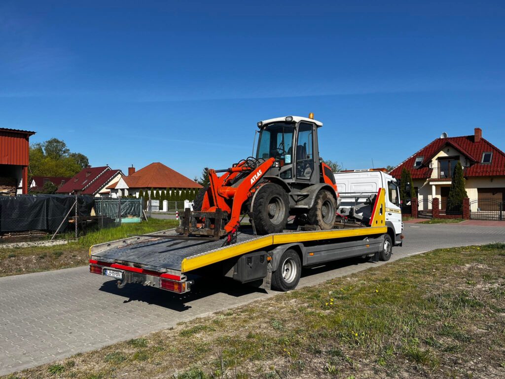 343984700_1286881141900731_3968422541011414715_n Transport maszyn budowlanych